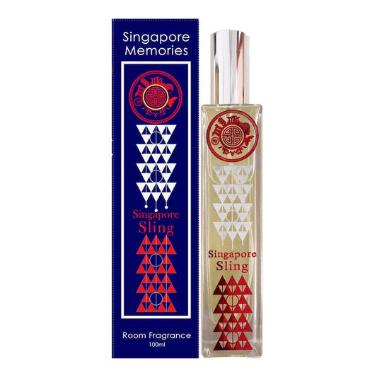 Singaporean sling perfume in a corporate gift blue color box next to a crystal bottle with wine shaped silver and red design and circle red logo of singapore tourist places