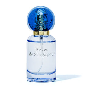 Reves De Singapour male perfume bottle with orchid cap in nice blue color 