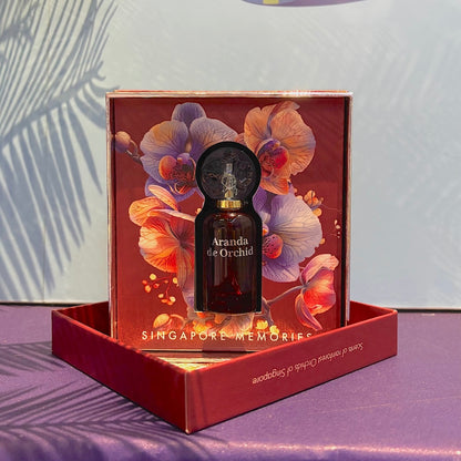 Bottle of Masculine Aranda de Orchid perfume by Singapore Memories men's fragrance with citrus, amber, and woody notes.