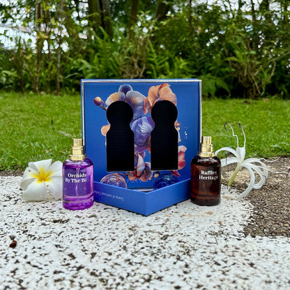 Singapore Memories couple perfume gift set – Raffles Heritage for men and Orchids by the Bay for women, elegant souvenir fragrances made in Singapore.