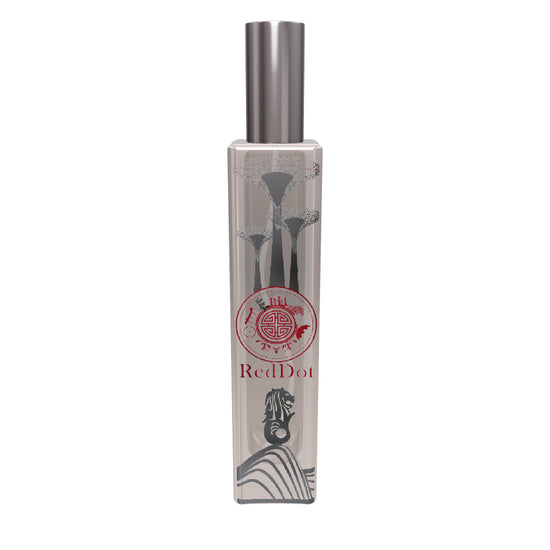 3d crystal perfume bottle with red dot text and design of merlion and other singapore symbols