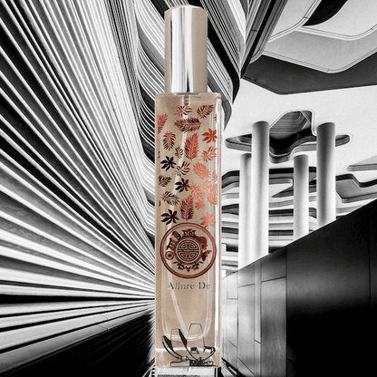 Elegant perfume bottle with intricate floral design set against a monochrome abstract backdrop, perfect for a sophisticated and luxurious fragrance presentation.