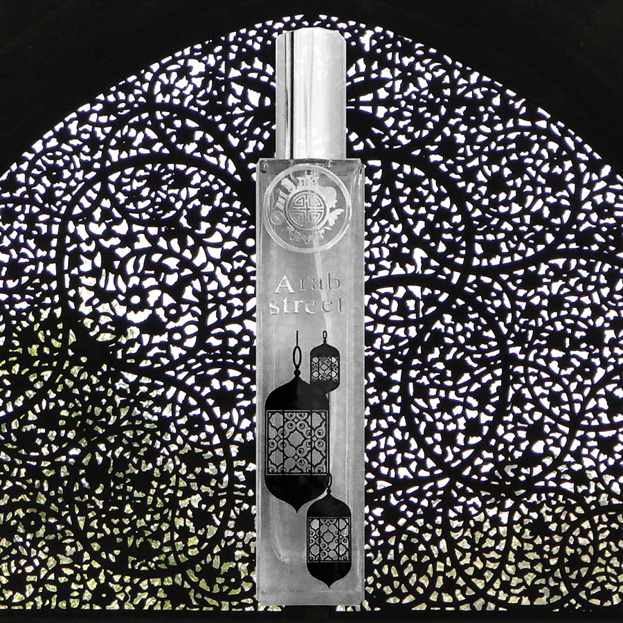 Arab street Perfume bottle with 'Alhambra' branding on a decorative black and white background