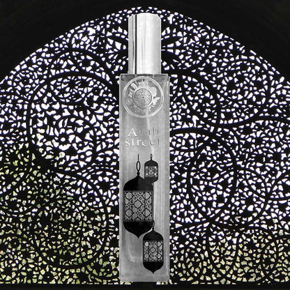 Arab street Perfume bottle with 'Alhambra' branding on a decorative black and white background