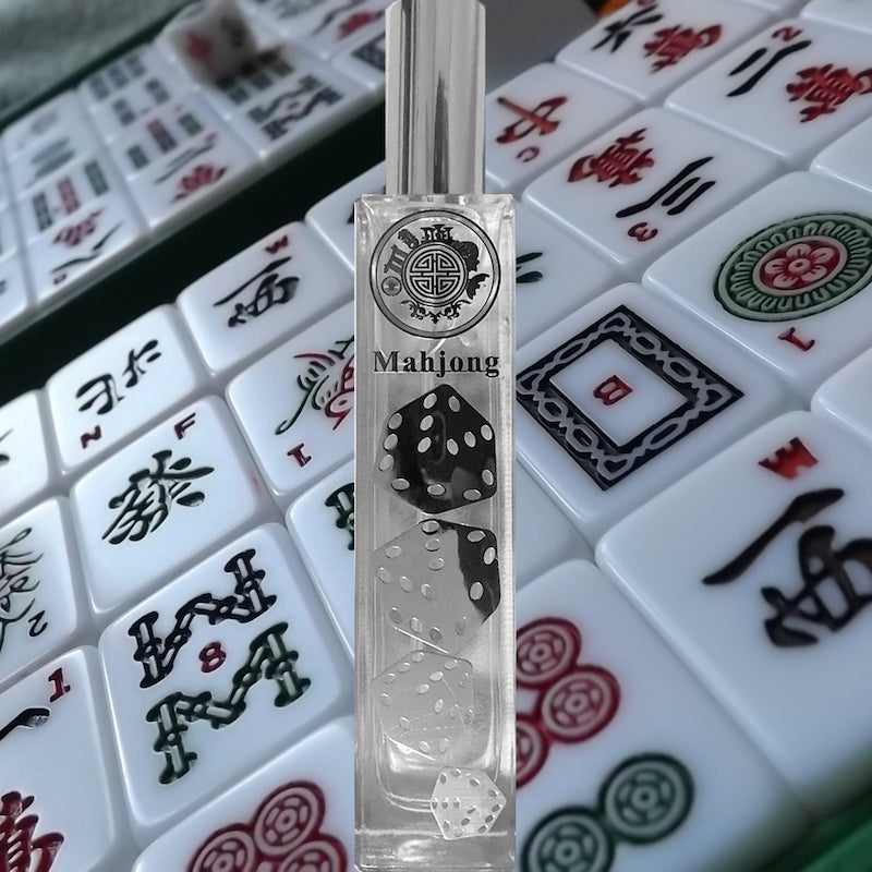 mahjong perfume bottle on top of game chips
