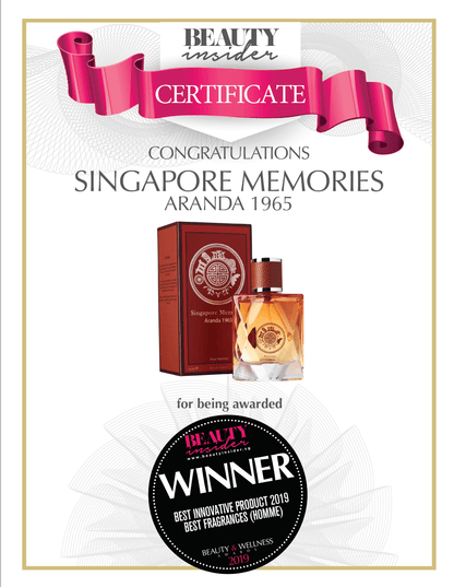 Perfume with packaging and award showing winner for best innovative fragrance & product on a white background for singapore memories aranda 1965