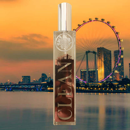 clean room fragrance in glass bottle in front of singapore skyline showing flyer and sea