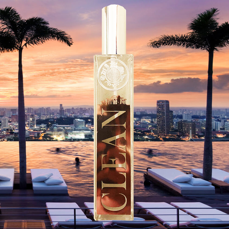 clean room fragrance bottle in front of pool with singapore skyline