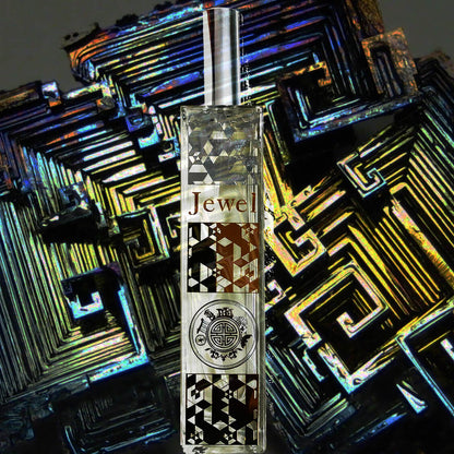 Product with 'Jewel' branding on a reflective, geometric-patterned background