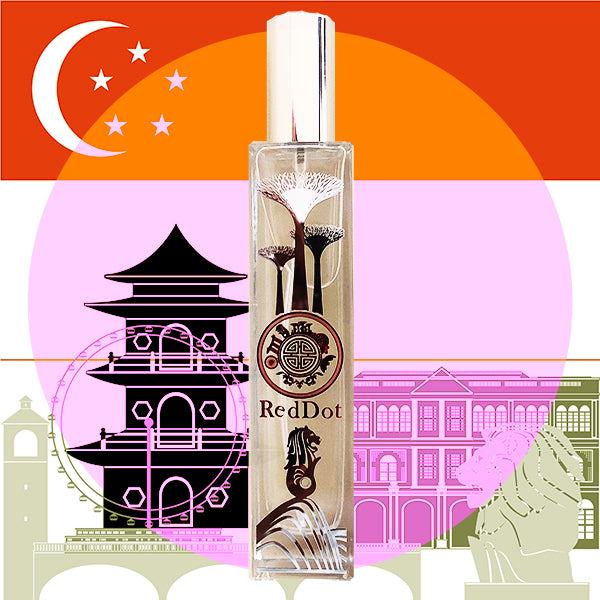 Red dot scent in glass bottle with singapore theme in front of colorful backfround