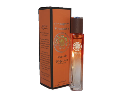 Perfume brand singapore Reves De Singapour by singapore memories in orange color glass bottle next to an orange color Corporate Gift box