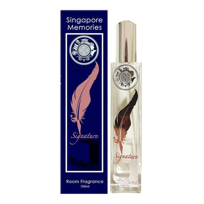 Signature singapore room fragrance in glass bottle next to a blue gift box with similar design on white background