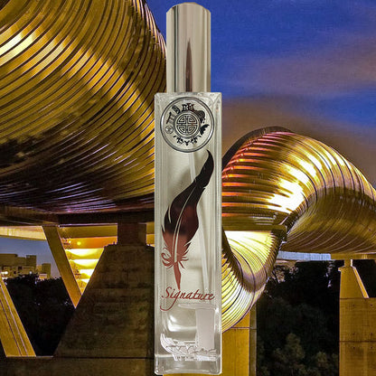 Signature singapore room fragrance bottle in front of a fancy bridge