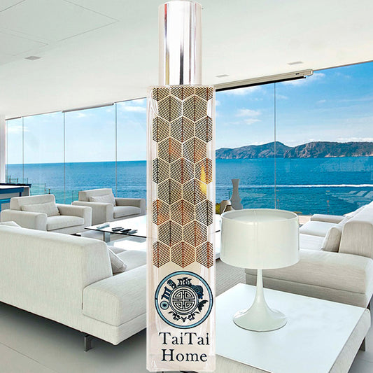 A tall, cylindrical fragrance diffuser with a geometric pattern in beige and white, featuring the brand name 'Tai Tai's House' at the bottom.